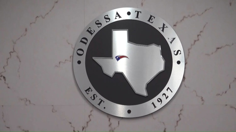 Odessa community members engage in discussions about city charter propositions.